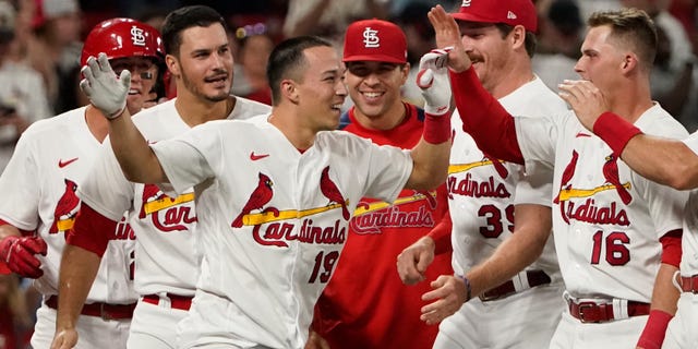 Cardinals' Tommy Edman was congratulated by his teammates after hitting a two-run double in a 6-5 win over the Washington Nationals in St. Louis on Wednesday, Sept. 7, 2022.