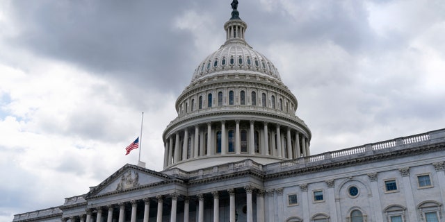 The American flag flies at half-staff over the U.S. Capitol, Thursday, Sept. 8, 2022,