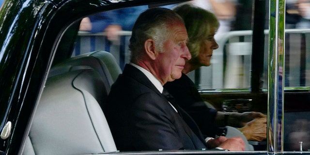 Britain's King Charles III and Camilla, the Queen Consort, arrive at Buckingham Palace after traveling from Balmoral Castle following the death of Queen Elizabeth II on Thursday, in London, on Friday, Sept. 9.