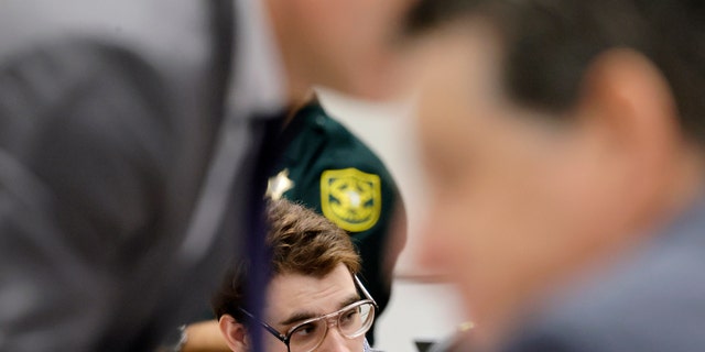 Marjory Stoneman Douglas High School shooter Nikolas Cruz is shown at the defense table during the penalty phase of Cruz's trial at the Broward County Courthouse in Fort Lauderdale, Fla., on Monday, Sept. 12, 2022. Cruz pleaded guilty to murdering 17 students and staff members in 2018 at Parkland's high school. The trial is only to determine if the 23-year-old is sentenced to death or life without parole. 