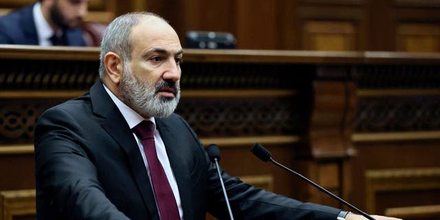 Armenian Prime Minister Nikol Pashinyan delivers a speech at the National Assembly of Armenia in Yerevan, Armenia, Tuesday, Sept. 13, 2022.