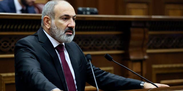 Armenian Prime Minister Nikol Pashinyan delivers a speech at the National Assembly of Armenia in Yerevan, Armenia, Tuesday, Sept. 13, 2022.