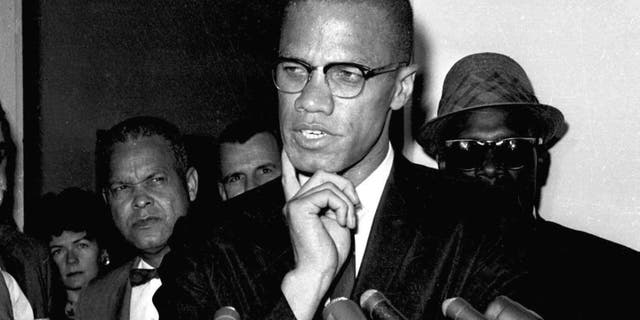 Malcolm X speaks to reporters in Washington on May 16, 1963. Fifteen years after being rejected as too controversial, Malcolm X has been inducted as the newest member of the Nebraska Hall of Fame.