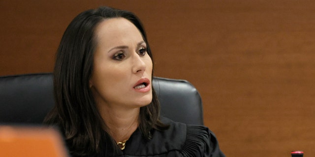 Judge Elizabeth Scherer having a heated courtroom exchange with Nikolas Cruz's defense lawyer Melisa McNeill Sept. 14, 2022, outside the earshot of jurors.