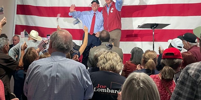 Virginia Governor Glenn Youngkin, center-right, gives a thumbs-up at an event in support of Republican Republican gubernatorial candidate Joe Lombardo, center-left, at the Nevada Trucking Association in Reno, Nevada. Lombardo, who is generally anti-abortion, says "It's the vote of the people of the state of Nevada, and I'm going to support that," on the prohibition of abortion.