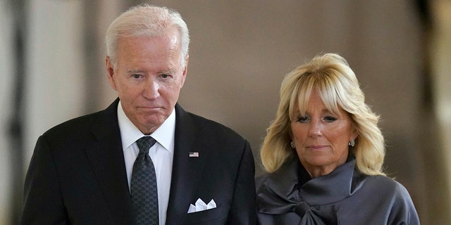 President Joe Biden and First Lady Dr. Jill Biden prepare to view the coffin of Queen Elizabeth II. 
