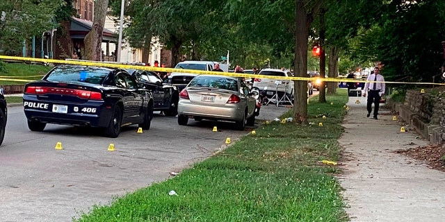Evidence markers dot the scene, Aug. 10, 2022, in Richmond, Indiana, where Richmond Police Department Officer Seara Burton was critically wounded. 