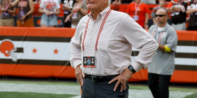 FILE- Browns owner Jimmy Haslam was hit by a plastic bottle thrown from the stands Sunday as he walked on the sideline after the New York Jets rallied to take the lead in the closing seconds. The Jets won 31-30.