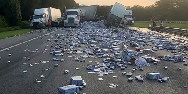 Cases of Coors Light beer were strewn across a highway after two semitrailers collided on the Florida road.