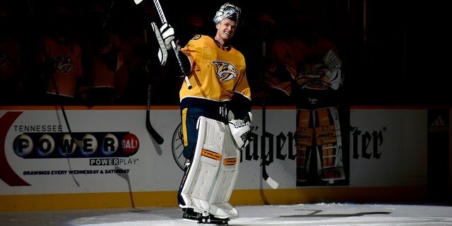 FILE - Nashville Predators goaltender Pekka Rinne (35) waves to the crowd during a standing ovation after the Predators defeated the Carolina Hurricanes in an NHL hockey game in Nashville, Monday, May 10, 2021. The Nashville Predators have brought back former goaltender Rinne in a new role as a special alumni advisor. General Manager David Poile announced the move Thursday, Sept. 22, 2022. 