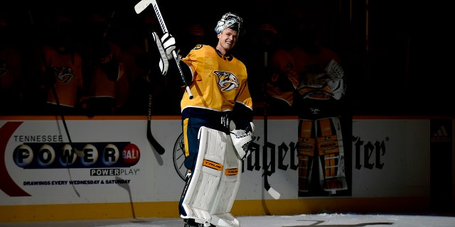 FILE - Nashville Predators goaltender Pekka Rinne (35) waves to the crowd during a standing ovation after the Predators defeated the Carolina Hurricanes in an NHL hockey game in Nashville, Monday, May 10, 2021. The Nashville Predators have brought back former goaltender Rinne in a new role as a special alumni advisor. General Manager David Poile announced the move Thursday, Sept. 22, 2022.