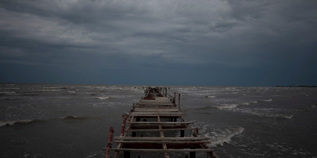 Hurricane Ian was growing stronger as it approached the western tip of Cuba on a track to hit the west coast of Florida as a major hurricane as early as Wednesday.