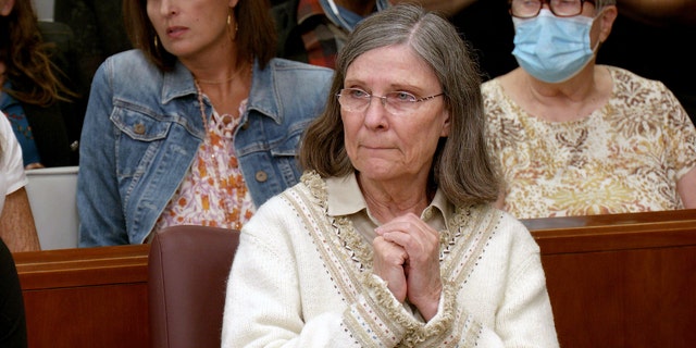Dana Chandler, above, awaits the jury verdict in her retrial at the Shawnee County District Court in Topeka, Kansas, on Sept. 1, 2022. A Kansas prosecutor has indicated that he intends to try Chandler for the third time in the killings of her ex-husband and his girlfriend two decades ago.