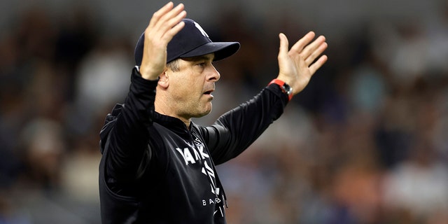 New York Yankees manager Aaron Boone reacts after talking with an umpire during the eighth inning of the team's baseball game against the Minnesota Twins on Thursday, Sept. 8, 2022, in New York. 