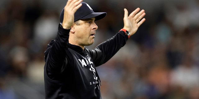 New York Yankees manager Aaron Boone reacts after talking with an umpire during the eighth inning of the team's baseball game against the Minnesota Twins on Thursday, Sept. 8, 2022, in New York.
