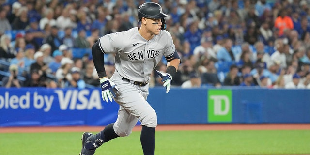 New York Yankees' Aaron Judge runs to first in Toronto, Monday, Sept. 26, 2022.