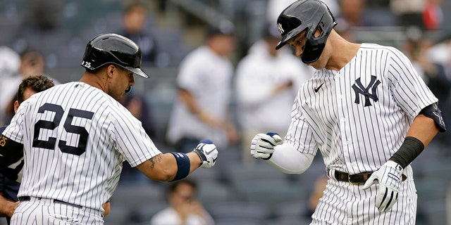 New York Yankees' Aaron Judge celebrates with Gleyber Torres (25) after hitting a home run against the Minnesota Twins on Sept. 7, 2022, in New York.