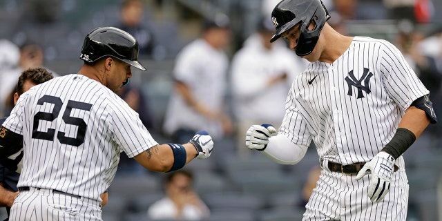 New York Yankees' Aaron Judge celebrates with Gleyber Torres, 25, after hitting a home run against the Minnesota Twins on Wednesday, Sept. 7, 2022 in New York City.