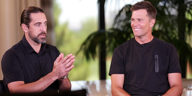 Aaron Rodgers and Tom Brady take part in the quarterback roundtable prior to Capital One's The Match VI - Brady, Rodgers v Allen & Mahomes at Wynn Golf Club on June 01, 2022, in Las Vegas, Nevada.