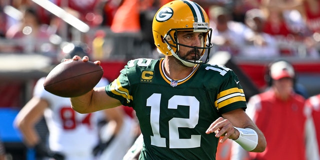 The Green Bay Packers' Aaron Rodgers throws during the first half of a game against the Tampa Bay Buccaneers Sept. 25, 2022, in Tampa, Fla. 