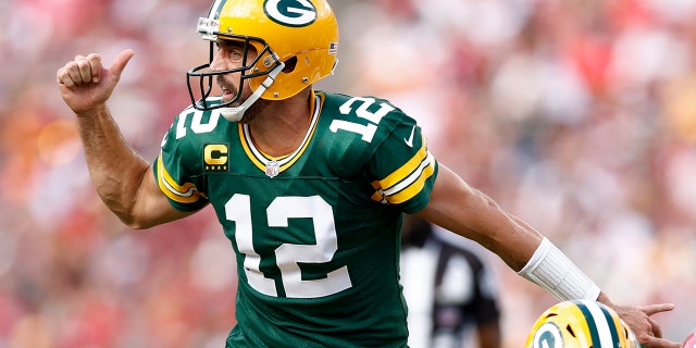 Aaron Rodgers, #12 of the Green Bay Packers, calls an audible against the Tampa Bay Buccaneers during the second quarter at Raymond James Stadium on Sept. 25, 2022 in Tampa, Florida.