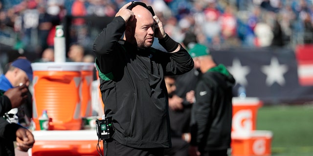 New York Jets defensive line coach Aaron Whitecotton is shown during a game against the New England Patriots at Gillette Stadium in Foxborough, Massachusetts on October 24, 2021.