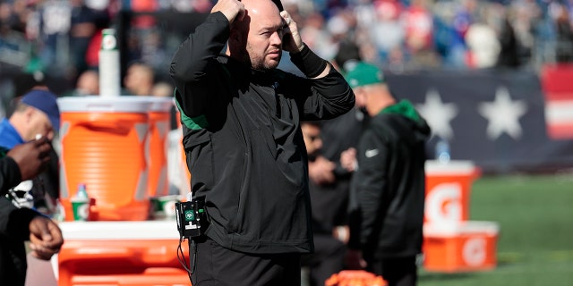 New York Jets defensive line coach Aaron Whitecotton is shown during a game against the New England Patriots at Gillette Stadium in Foxborough, Massachusetts, on Oct. 24, 2021.