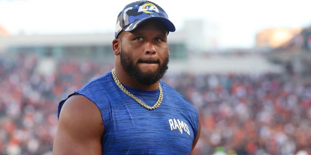 Los Angeles Rams defensive tackle Aaron Donald walks off the field after a game against the Cincinnati Bengals Aug. 27, 2022, at Paycor Stadium in Cincinnati.