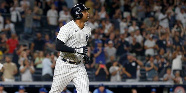 Aaron Hicks #31 of the New York Yankees draws a bases loaded walk against the Kansas City Royals at Yankee Stadium on July 29, 2022 in New York City. The Yankees defeated the Royals 11-5.