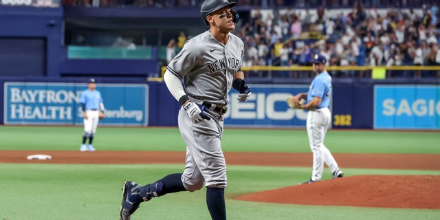 Aaron Judge of the New York Yankees rounds the bases after his home run against the Tampa Bay Rays during the ninth inning at Tropicana Field in St. Petersburg, Florida, on Sept. 3, 2022.