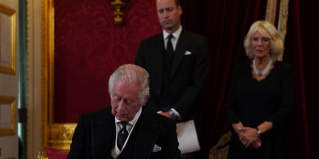 King Charles III signs an oath to uphold the security of the Church in Scotland during the Accession Council at St James's Palace, London, Saturday, Sept. 10, 2022, where he is formally proclaimed monarch.