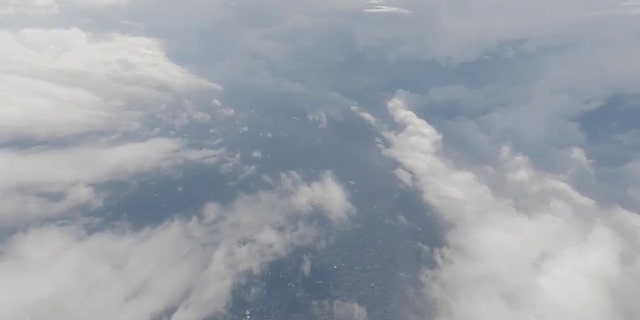 An Air Force squadron flew into Hurricane Ian Tuesday, capturing video of the water below.