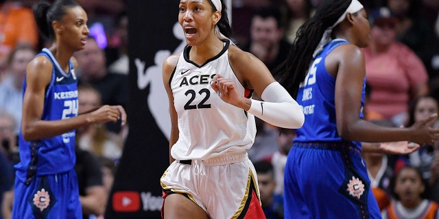 Las Vegas Aces' A'ja Wilson reacts after being fouled during the first half of Game 4 of the WNBA Finals against the Connecticut Sun in Uncasville, Connecticut on September 18, 2022.