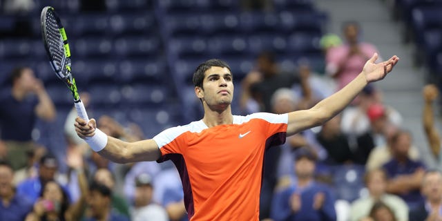 Carlos Alcaraz of Spain reacts to winning a point in a fourth set against Jannik Sinner of Italy during their Men’s Singles Quarterfinal match on Day Ten of the 2022 US Open at USTA Billie Jean King National Tennis Center on September 07, 2022 in the Flushing neighborhood of the Queens borough of New York City.