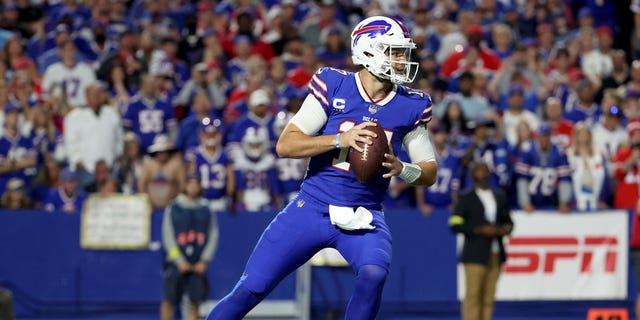 Buffalo Bills No. 17 Josh Allen looks for a pass against the Tennessee Titans in the first half of the game at Highmark Stadium on September 29.  February 19, 2022 in Orchard Park, New York.