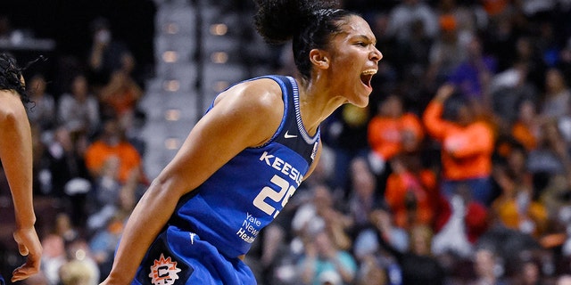 Connecticut Sun's Alyssa Thomas reacts during the first half in Game 3 of a WNBA basketball final playoff series against the Las Vegas Aces, Thursday, Sept. 15, 2022, in Uncasville, Conn.