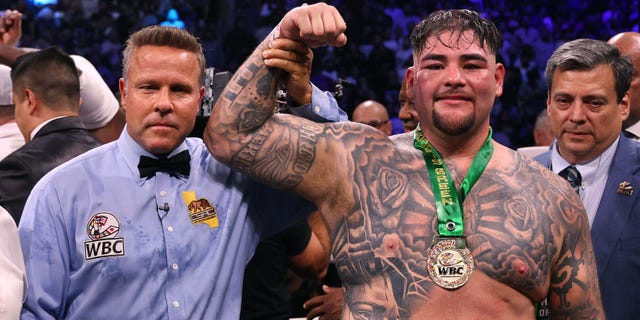 Referee Thomas Taylor lifts the arm up of Andy Ruiz Jr. after his unanimous decision win over Luis Ortiz during a WBC world heavyweight title eliminator fight on Sept. 4, 2022, in Los Angeles.