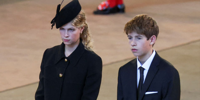 His parents Edward and Sophie were also in attendance as they watched their two children stand vigil from a viewing platform. 