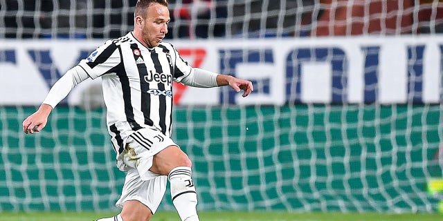 Arthur Melo of Juventus dribbles during the Serie A match between Genoa CFC and Juventus at Stadio Luigi Ferraris in Genoa, Italy, on April 30, 2022.