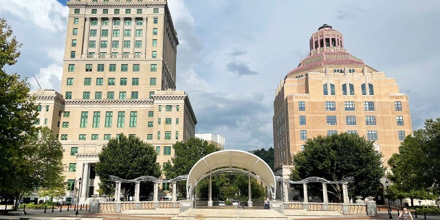 Buncombe County Courthouse, left, and Asheville City Hall, right, both of which are in the Downtown Asheville Historic District and listed on the National Register of Historic Places.