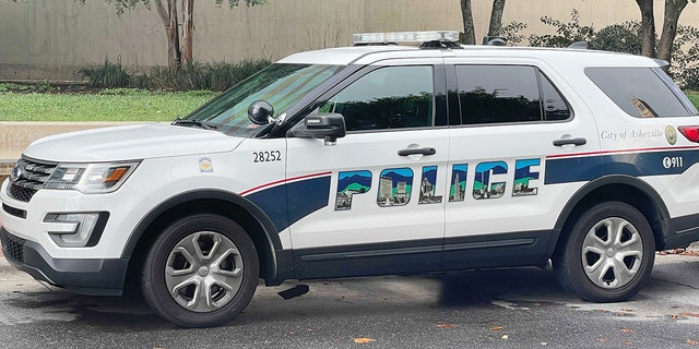An Asheville Police Department vehicle parked in downtown Asheville, North Carolina.