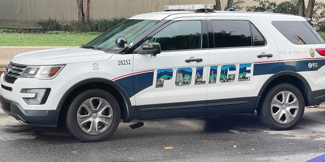 An Asheville Police Department vehicle parked in downtown Asheville, North Carolina.