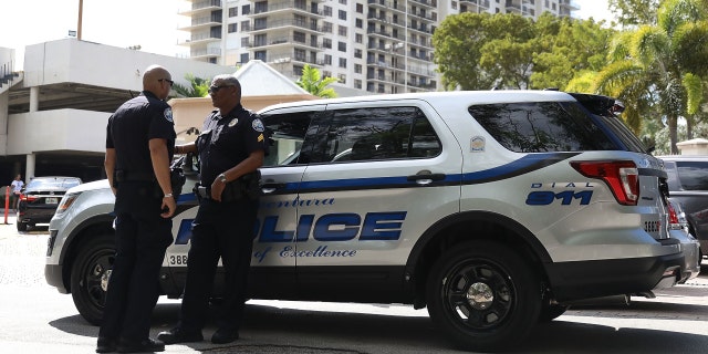 FILE - Police officers respond to a call in Aventura, Florida, on Oct. 26, 2018.