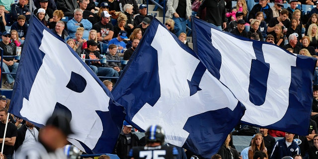 BYU flags fly in the stadium during a game between the BYU Cougars and the Oregon State Beavers during the first half of a college football game October 13, 2012 at LaVell Edwards Stadium in Provo, Utah.