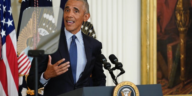 Former President Barack Obama speaks after he and former first lady Michelle Obama unveiled their official White House portraits during a ceremony in the East Room 