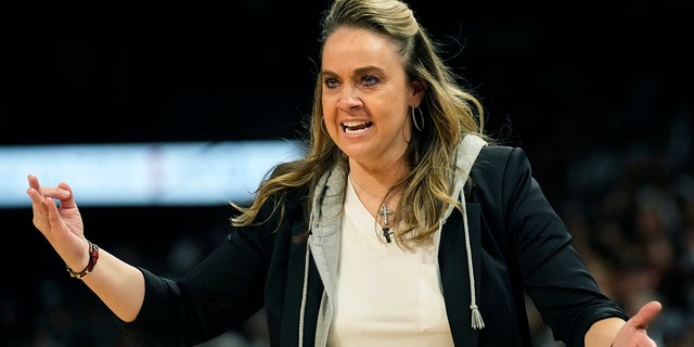 Las Vegas Aces head coach Becky Hammon speeds to the court during the first half of Game 2 of the WNBA Basketball Finals playoff series against the Connecticut Suns on Tuesday, September 13, 2022 in Las Vegas.