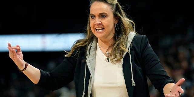 Las Vegas Aces head coach Becky Hammon speeds to the court during the first half of Game 2 of the WNBA Basketball Finals playoff series against the Connecticut Suns on Tuesday, September 13, 2022 in Las Vegas.