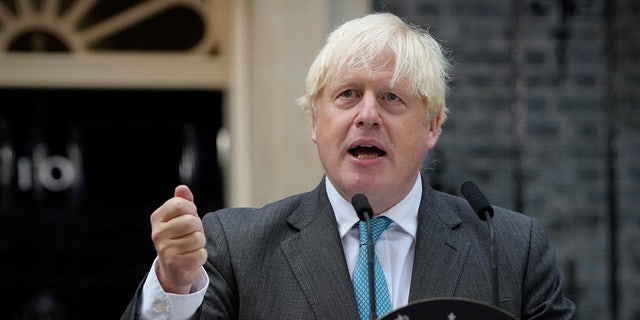 Outgoing British Prime Minister Boris Johnson speaks outside Downing Street in London, Tuesday, Sept. 6, 2022 before heading to Balmoral in Scotland, where he will announce his resignation to Britain's Queen Elizabeth II. Later on Tuesday Liz Truss will formally become Britain's new Prime Minister after an audience with the Queen.