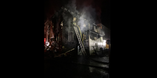 The aftermath of a fire in Rosslyndale, Massachusetts, early Saturday morning.