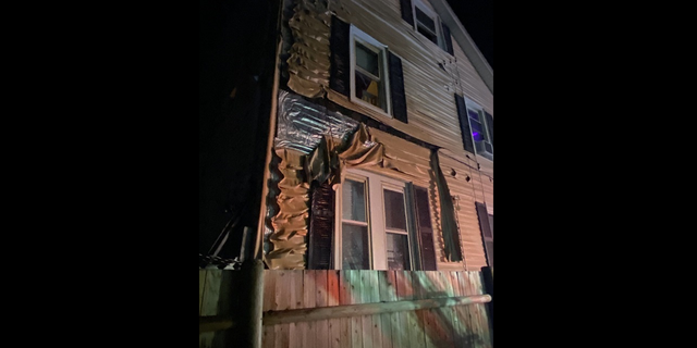 The heat released from the fire caused the siding of an adjacent building to melt, according to the Boston Fire Department.